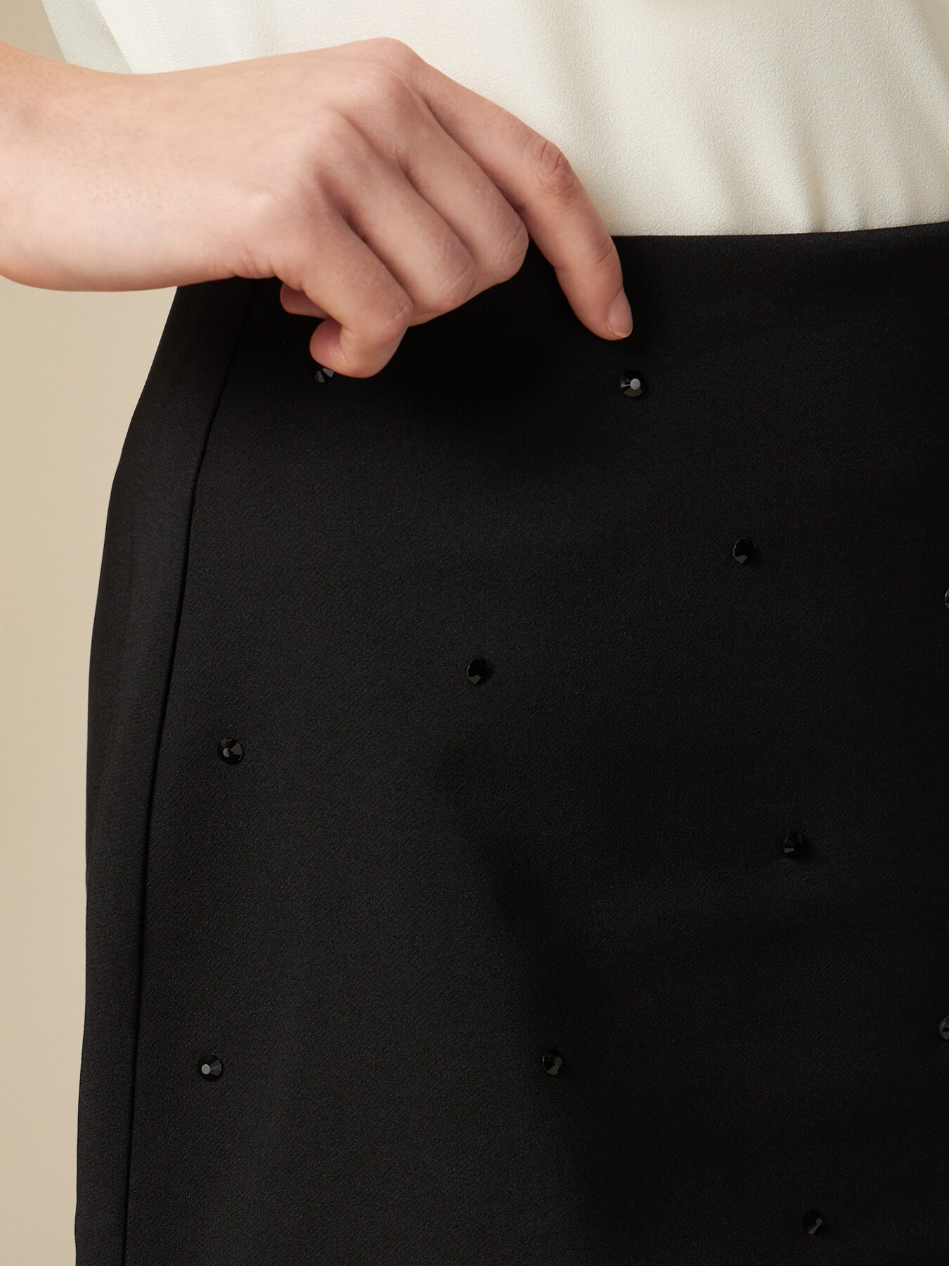 Short skirt with a cascade of rhinestones image number 2