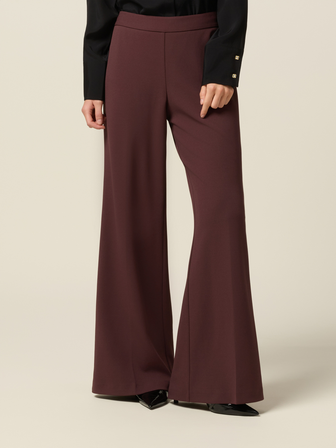 Pantalones palazzo de tejido crep&eacute; image number 3