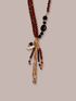 Collana con perline sfaccettate e pietre image number 1
