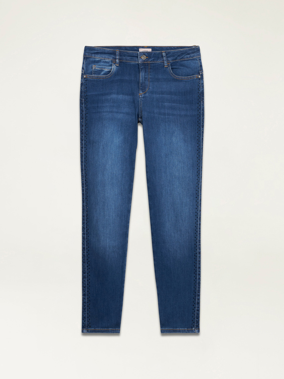Jeans skinny con applicazione di strass