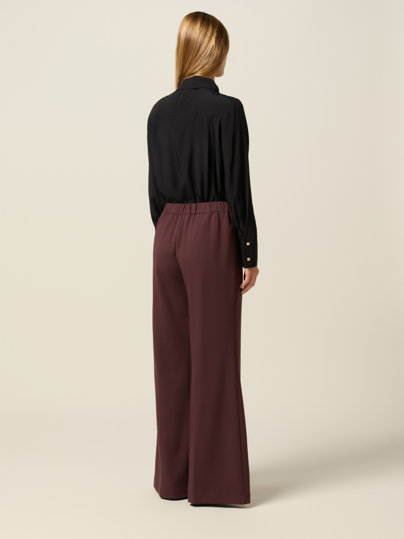 Pantalones palazzo de tejido crep&eacute; image number 1