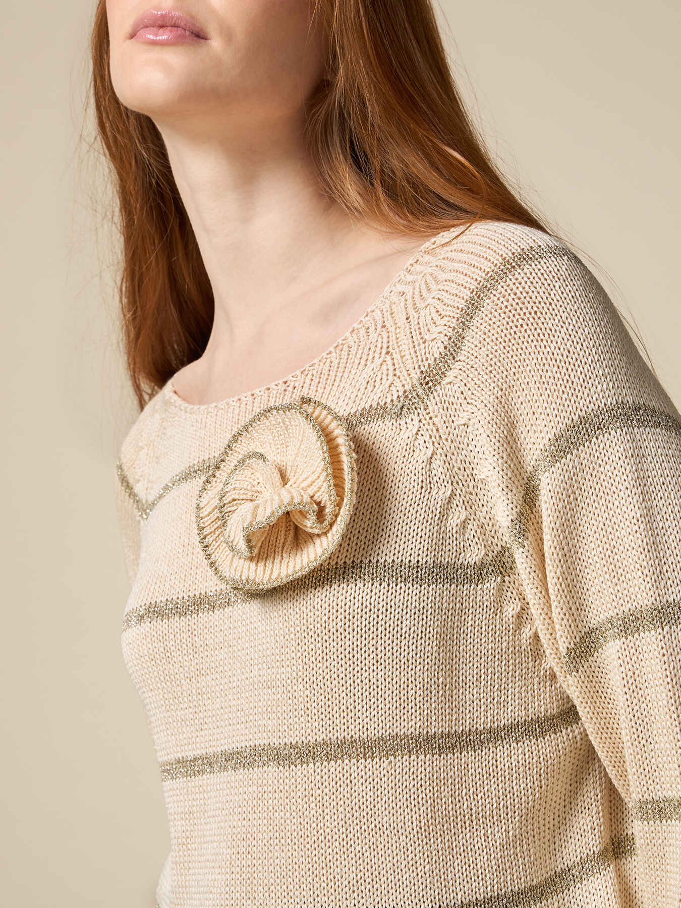 Striped sweater with flower brooch image number 2