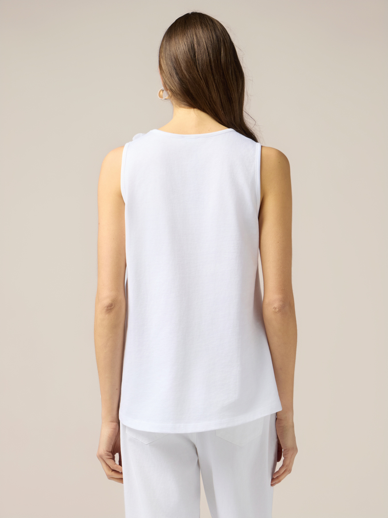 Top in jersey con applicazioni floreali image number 1