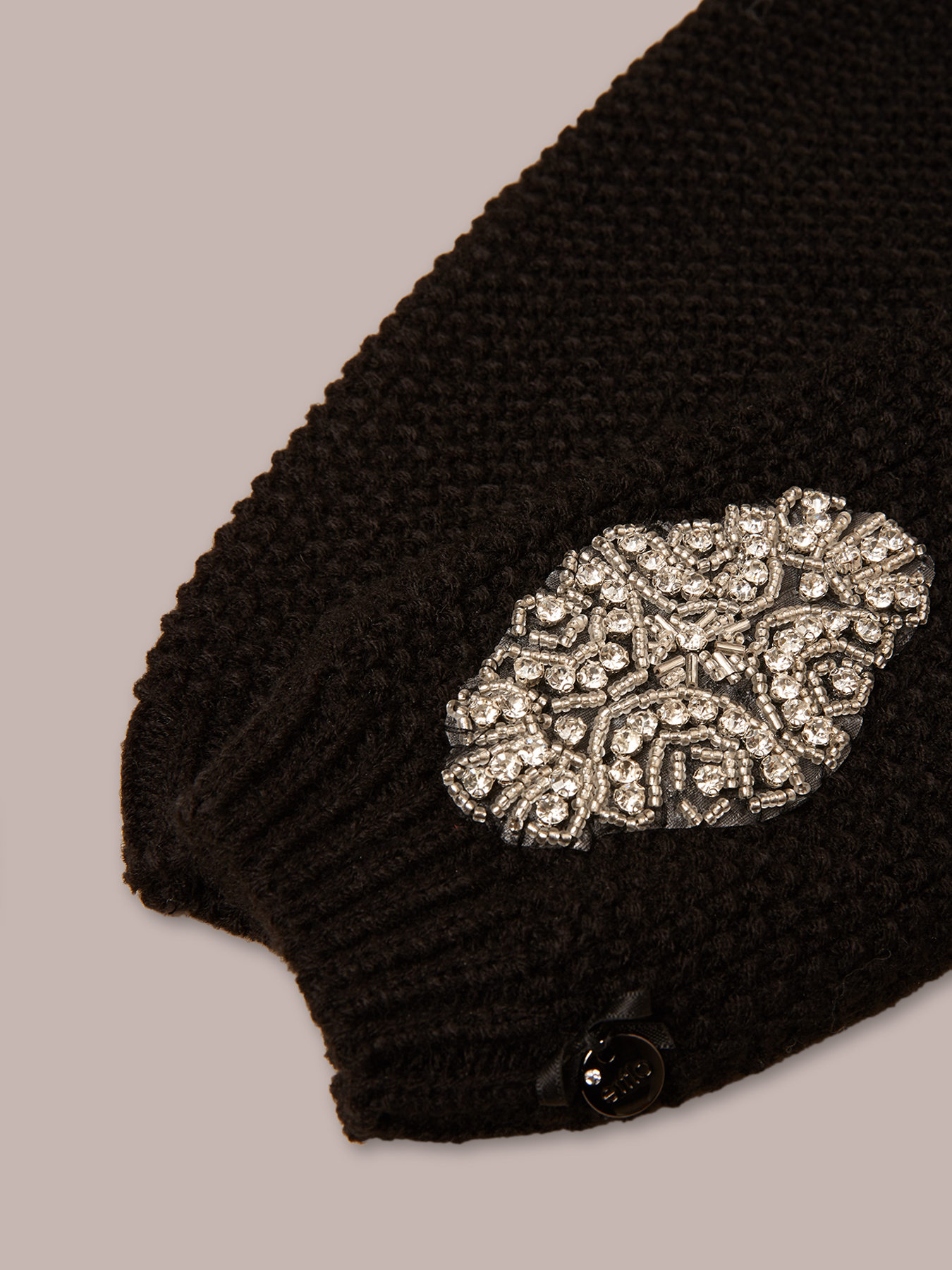 Manicotti in maglia con pietre image number 2