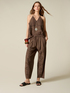 Cropped trousers in perforated cotton image number 0