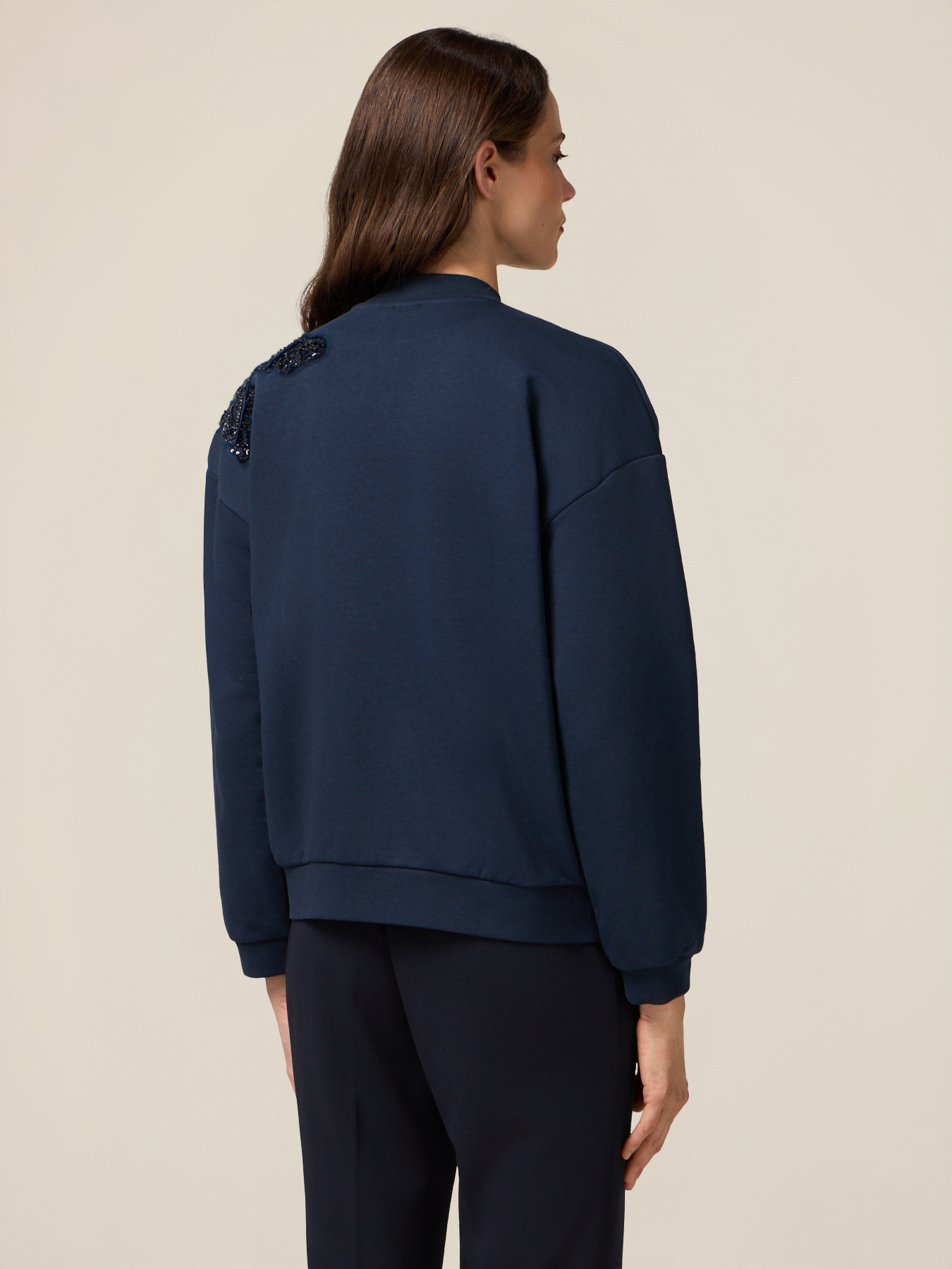 Sudadera con cremallera y bordado de joya image number 1