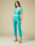 Stovepipe trousers with chain image number 0