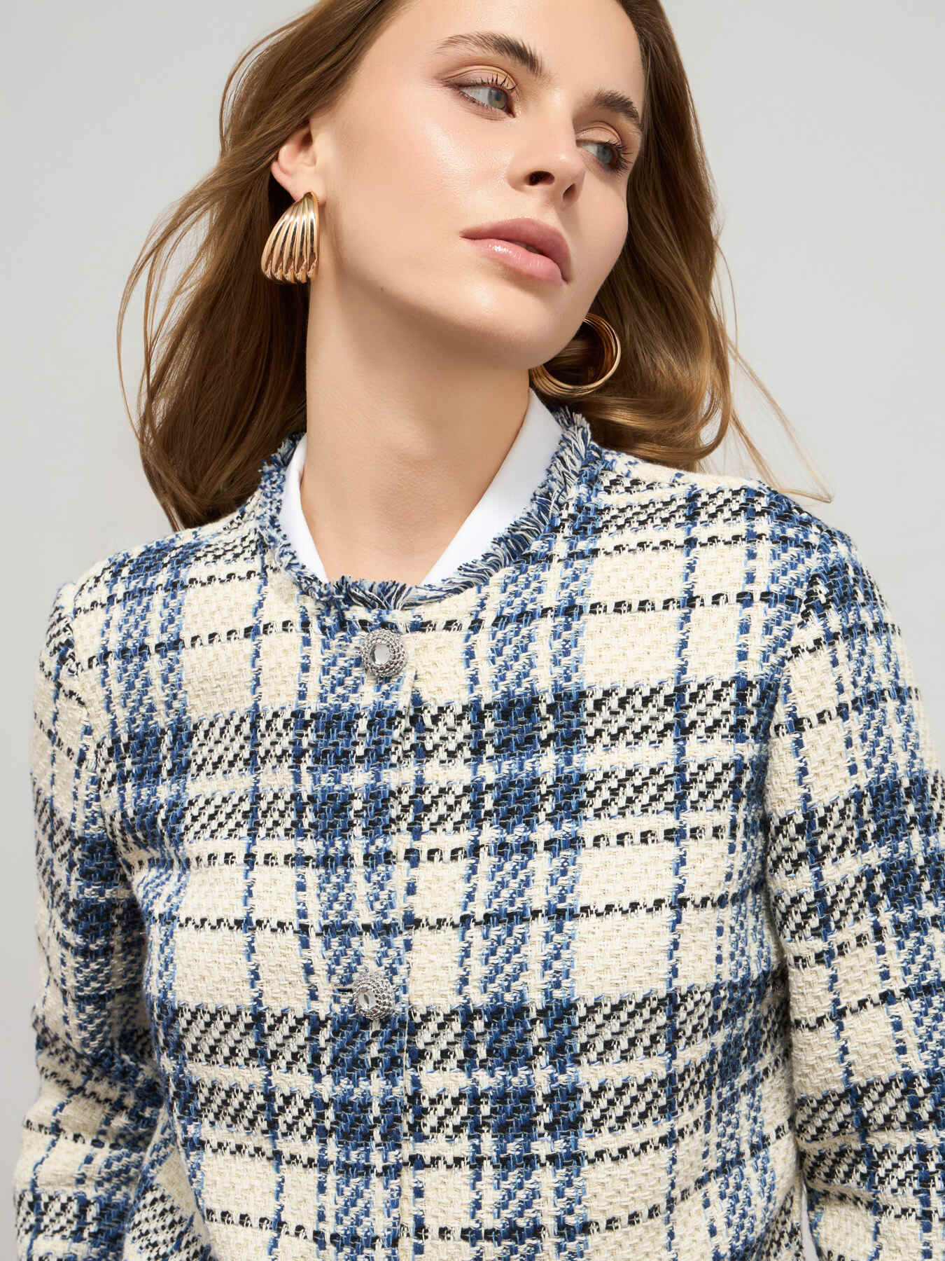 Tweed jacket with fringe