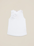 Top in jersey con applicazioni floreali image number 3