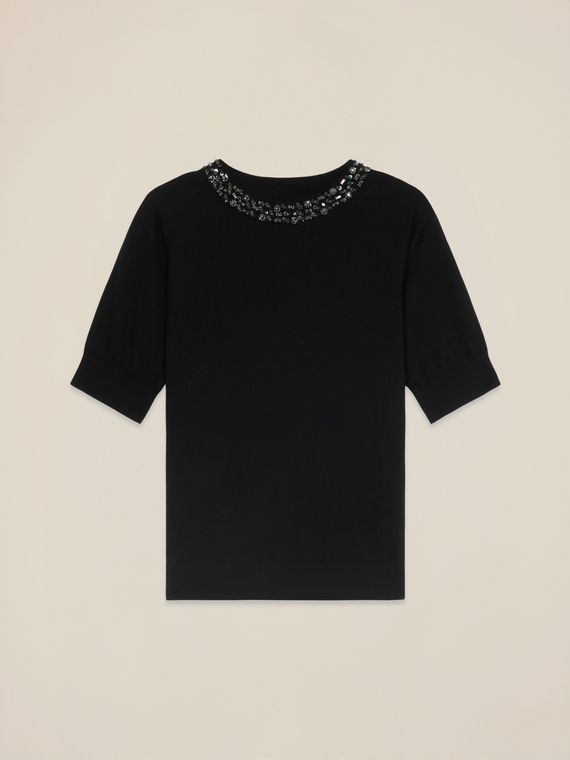 Crewneck sweater with decorations